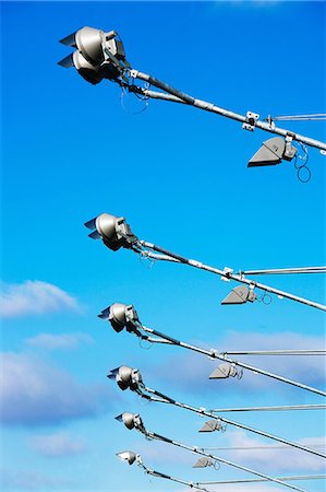 power button - Row of stadium spotlights Stock Photo - Premium Royalty-Free, Code: 614-06813344