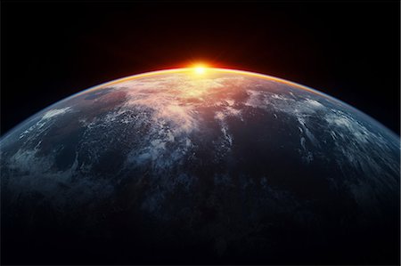 earth globe not satellite not people - Sunlight eclipsing planet earth Stock Photo - Premium Royalty-Free, Code: 614-06813416