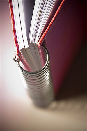 red on red - Spiral bound notebook Stock Photo - Premium Royalty-Free, Code: 614-06813441