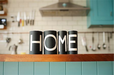 simsearch:614-06813495,k - Word 'Home' on kitchen counter Stock Photo - Premium Royalty-Free, Code: 614-06813491