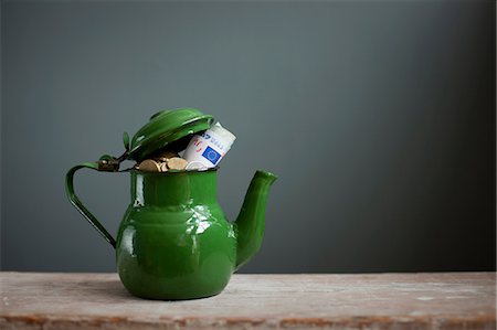 retro - Teapot with Euros inside Stock Photo - Premium Royalty-Free, Code: 614-06813506