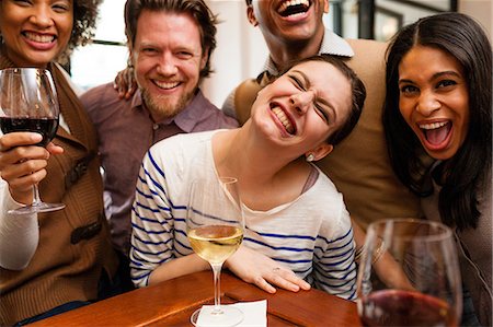 people drinking white wine - Group photo with huge smiles Stock Photo - Premium Royalty-Free, Code: 614-06813641