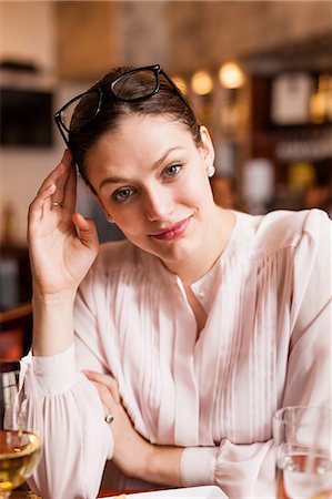 Woman with spectacles on head Stock Photo - Premium Royalty-Free, Code: 614-06813660