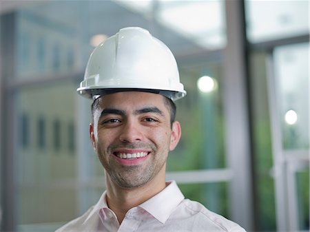 simsearch:614-06895837,k - Mid adult builder wearing hard hat, portrait Stock Photo - Premium Royalty-Free, Code: 614-06895698