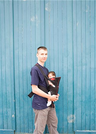 father baby outdoors joy two people - Father and baby boy in baby carrier Stock Photo - Premium Royalty-Free, Code: 614-06896835