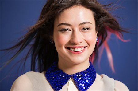 sequins - Portrait of young woman with dyed hair and blue sequin collar Stock Photo - Premium Royalty-Free, Code: 614-06896868