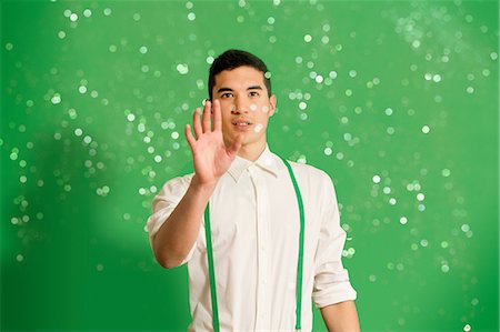 Portrait of young man with glitter Foto de stock - Sin royalties Premium, Código: 614-06896898