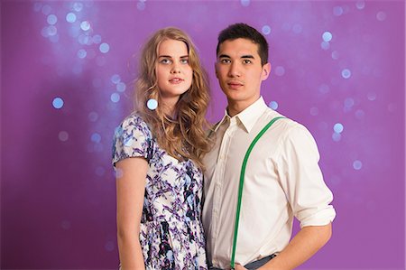 Portrait of young couple and glitter Photographie de stock - Premium Libres de Droits, Code: 614-06896900