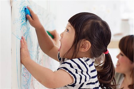 drawing - Close up portrait of female toddler having fun drawing Stock Photo - Premium Royalty-Free, Code: 614-06896945