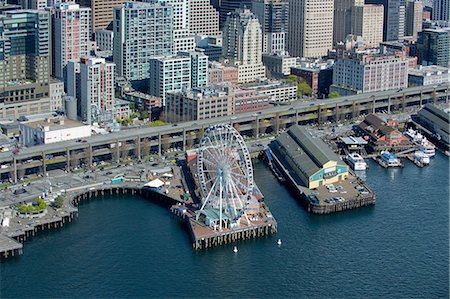 Aerial view of ferris wheel and waterfront, Seattle, Washington State, USA Stock Photo - Premium Royalty-Free, Code: 614-06897017