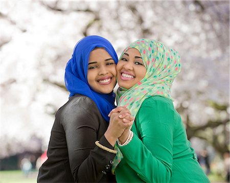 spring young woman - Portrait of two young females in park dancing together Foto de stock - Sin royalties Premium, Código: 614-06897046