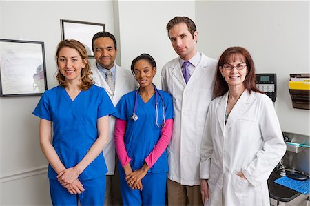 doctor woman scrubs confident - Medical professionals together in hospital, portrait Stock Photo - Premium Royalty-Free, Code: 614-06897471