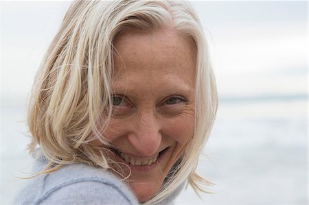 pretty gray hair smiling - Portrait of mature woman smiling towards camera Stock Photo - Premium Royalty-Free, Code: 614-06897726