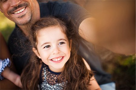 family looking up - Father and daughter photographing themselves Stock Photo - Premium Royalty-Free, Code: 614-06898057