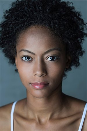 Portrait of woman with afro hair Fotografie stock - Premium Royalty-Free, Codice: 614-06898148