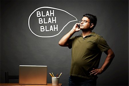 pictograph - Man listening intently on mobile phone Stock Photo - Premium Royalty-Free, Code: 614-06898225