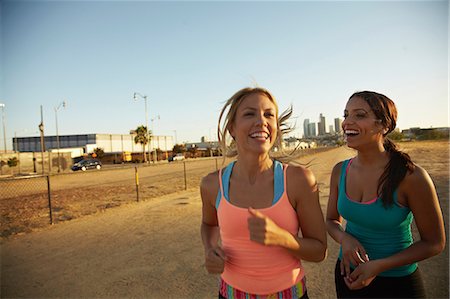 simsearch:614-06898313,k - Women jogging and laughing Stock Photo - Premium Royalty-Free, Code: 614-06898355