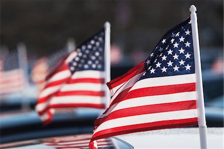 patriotic - American flags on car roof Stock Photo - Premium Royalty-Free, Code: 614-06974091