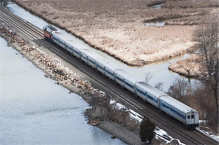 Aerial view of train travelling though countryside Photographie de stock - Premium Libres de Droits, Code: 614-06974119