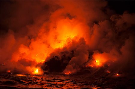 simsearch:6119-07443845,k - Smoke clouds from lava flow impacting sea at night, Kilauea volcano, Hawaii Stock Photo - Premium Royalty-Free, Code: 614-06974283