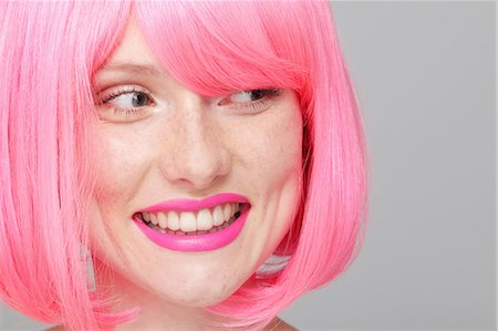 rossetto - Close up of teenage girl with pink hair Fotografie stock - Premium Royalty-Free, Codice: 614-06974517