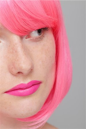 simsearch:640-02657383,k - Close up of teenage girl with pink hair Stock Photo - Premium Royalty-Free, Code: 614-06974518