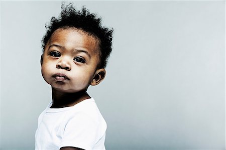 puré - Portrait of baby boy wearing white looking at camera Stock Photo - Premium Royalty-Free, Code: 614-06974669