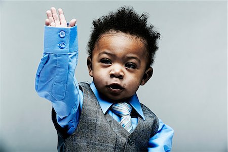 Portrait of baby boy wearing waistcoat, shirt and tie Photographie de stock - Premium Libres de Droits, Code: 614-06974688