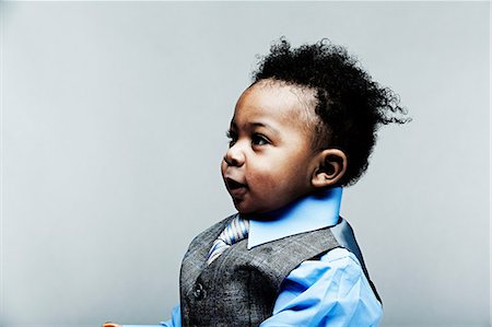 Portrait of baby boy wearing waistcoat, shirt and tie Stock Photo - Premium Royalty-Free, Code: 614-06974683