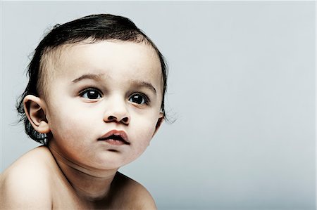 simsearch:614-06442357,k - Portrait of baby boy looking away Stock Photo - Premium Royalty-Free, Code: 614-06974709