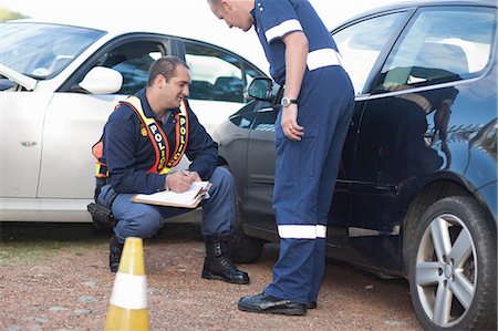 police officer full body - Car accident scene Stock Photo - Premium Royalty-Free, Code: 614-06973603