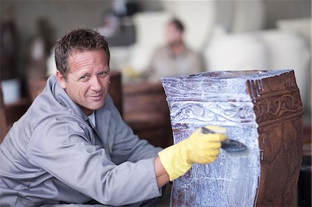 Painting and staining process in pottery factory Stock Photo - Premium Royalty-Free, Code: 614-06973626