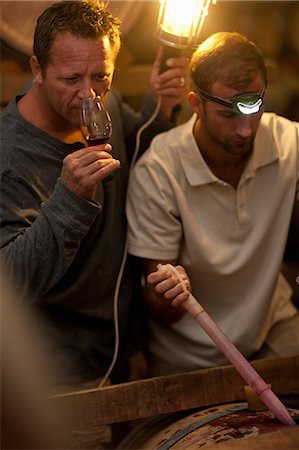 row of monitors - Sampling wine in barrels Stock Photo - Premium Royalty-Free, Code: 614-06973687