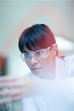 scientific lab - Woman working in laboratory Stock Photo - Premium Royalty-Free, Code: 614-06973709