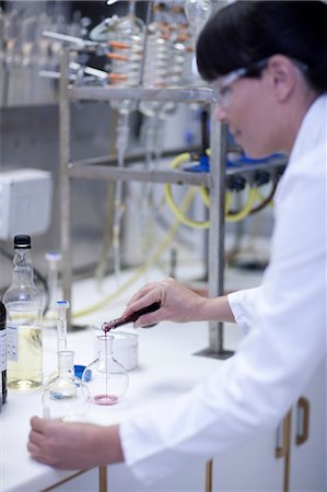 quality testing - Oenologist mixing during sample testing in laboratory Stock Photo - Premium Royalty-Free, Code: 614-06973703