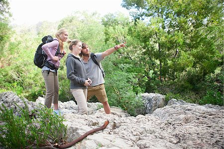 explore vacation - Group of young hikers on rock Stock Photo - Premium Royalty-Free, Code: 614-06973804