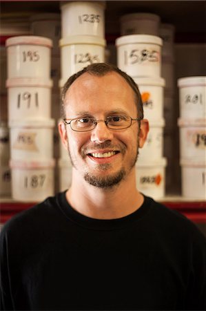 portrait of man in workshop - Portrait of small business manager in warehouse Stock Photo - Premium Royalty-Free, Code: 614-07031315