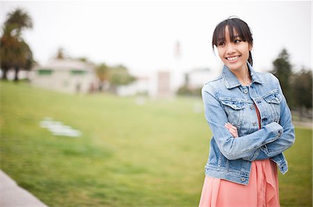 Portrait of young girl in park Stock Photo - Premium Royalty-Free, Code: 614-07031908
