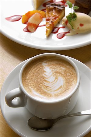 photography smelling fruit - Still life of frothy coffee with plate of tart and ice cream Stock Photo - Premium Royalty-Free, Code: 614-07032084