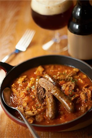 selective focus beer - Still life with sausage stew and beer Stock Photo - Premium Royalty-Free, Code: 614-07032103