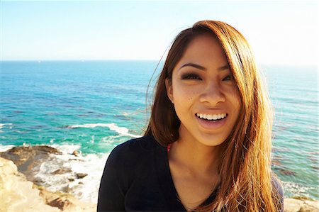 palos verdes - Portrait of young woman smiling, Palos Verdes, California, USA Stock Photo - Premium Royalty-Free, Code: 614-07032150