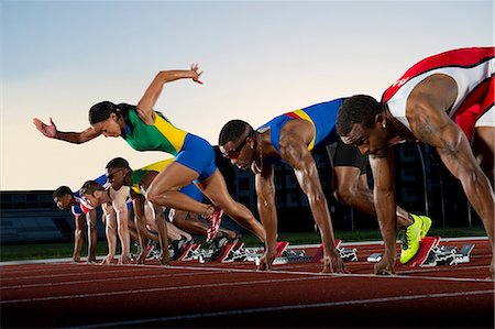 equality human - False start in race, woman running against men Stock Photo - Premium Royalty-Free, Code: 614-07145729