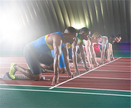 Athletes on start line of race Foto de stock - Sin royalties Premium, Código: 614-07145733