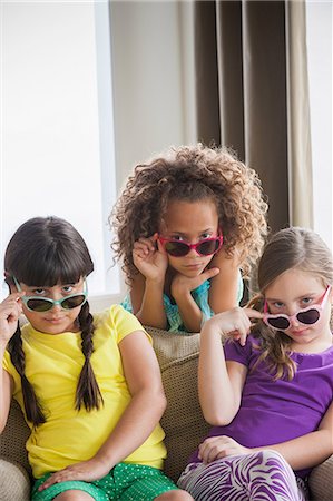 simsearch:614-07146298,k - Portrait of three girls wearing sunglasses Stock Photo - Premium Royalty-Free, Code: 614-07146316