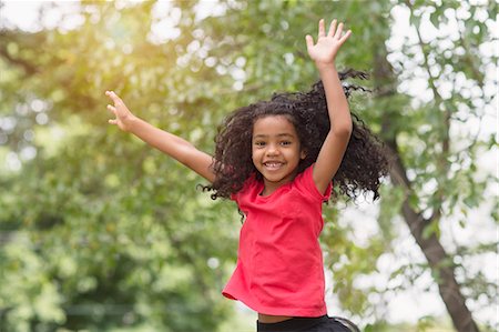 simsearch:614-09168173,k - Young girl jumping and having fun in park Photographie de stock - Premium Libres de Droits, Code: 614-07194730