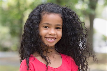 portrait in cute child girl - Close up portrait of young girl in park Foto de stock - Sin royalties Premium, Código: 614-07194731