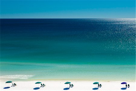 simsearch:6122-07695082,k - Beach umbrellas and deck chairs on beach, Destin, Florida, USA Stock Photo - Premium Royalty-Free, Code: 614-07194795