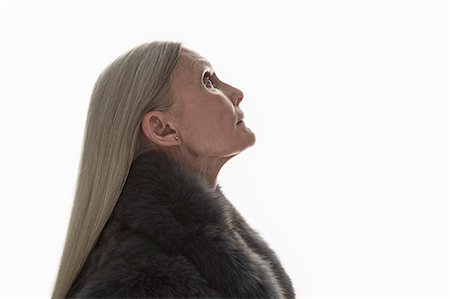 fur coats for women image - Studio shot of mature woman in profile Stock Photo - Premium Royalty-Free, Code: 614-07240043