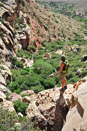 Female hiker standing on rock, Mount Wilson, Red Rock Canyon, Nevada, USA Stock Photo - Premium Royalty-Free, Code: 614-07240105