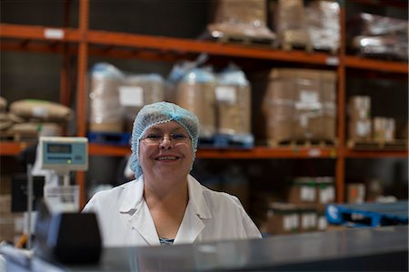 factory happy - Portrait of mature factory worker, smiling Stock Photo - Premium Royalty-Free, Code: 614-07240159